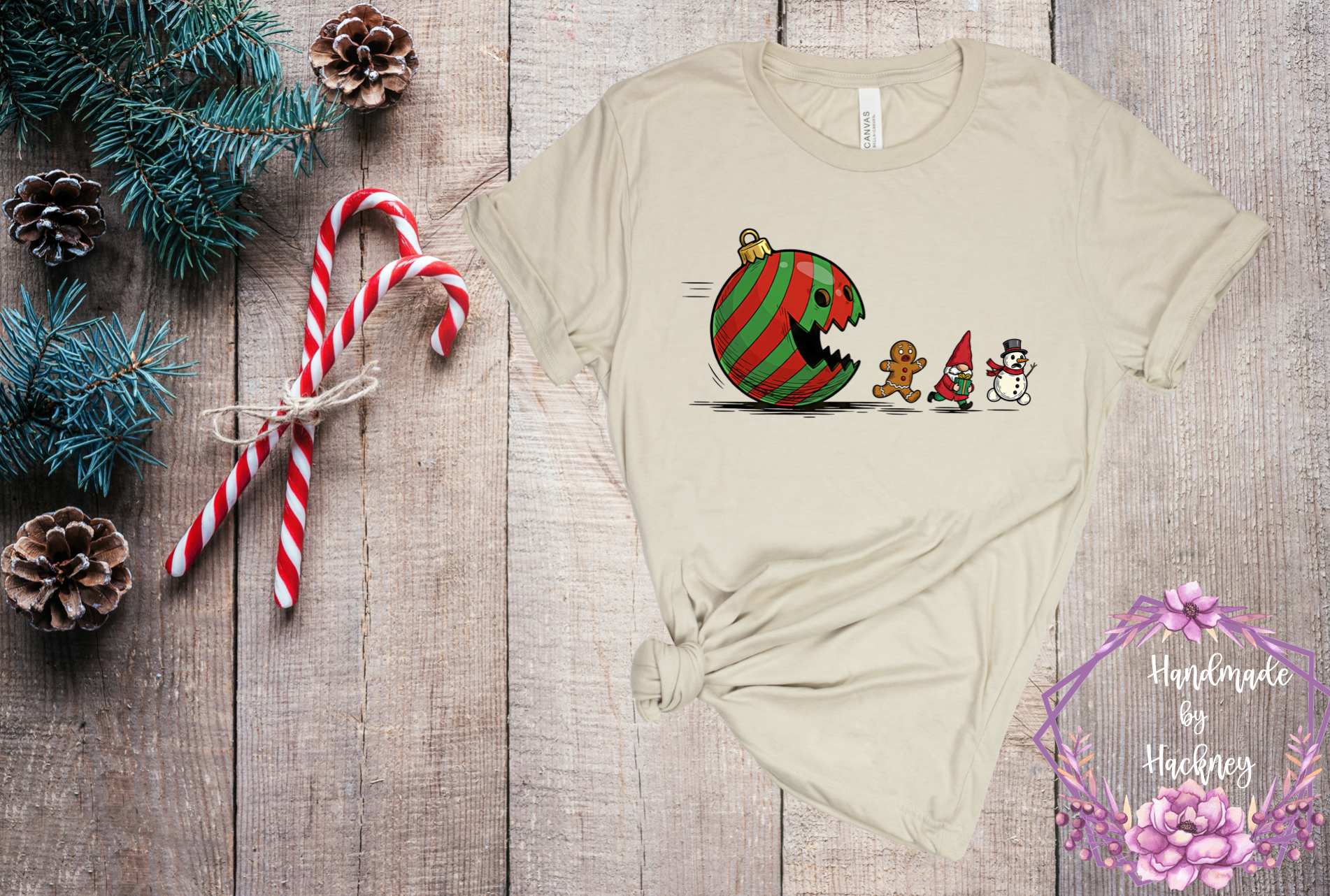 Ornament ball chasing gingerbread man, gnome, and snowman