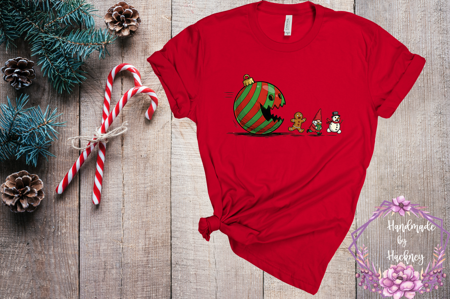 Ornament ball chasing gingerbread man, gnome, and snowman