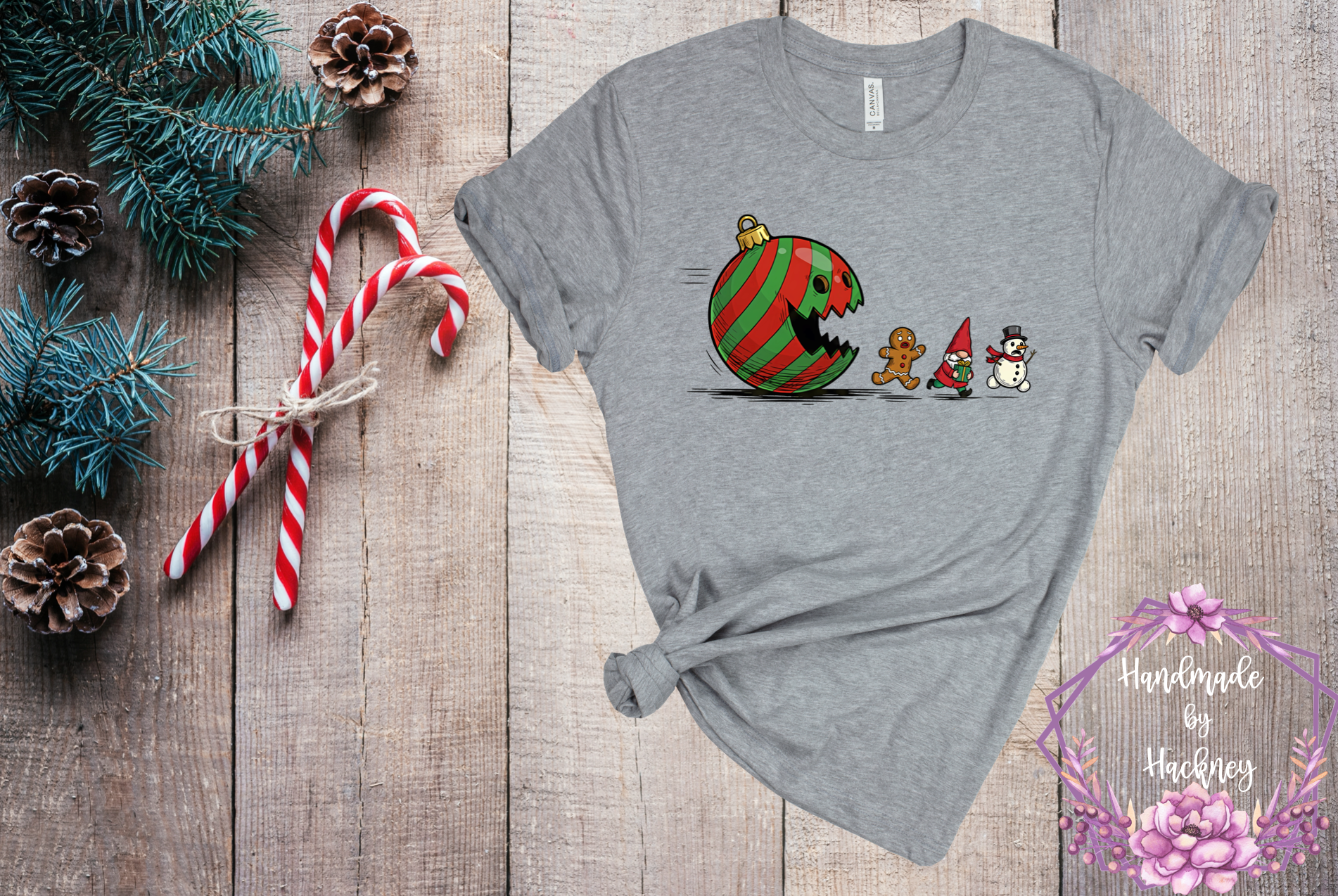 Ornament ball chasing gingerbread man, gnome, and snowman